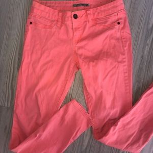 Bright coral skinny jeans